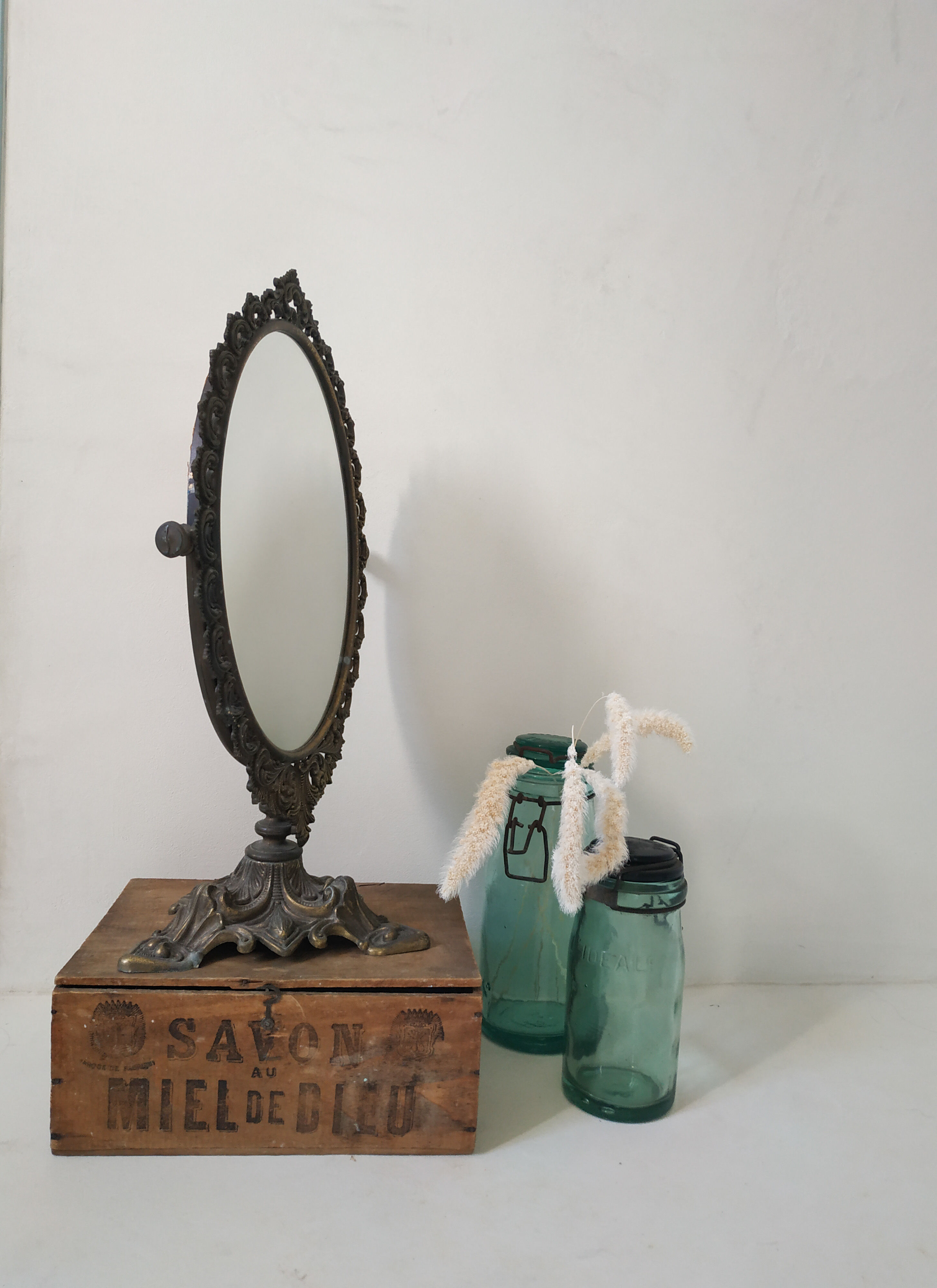 Old mirror on foot metal 30x46cm