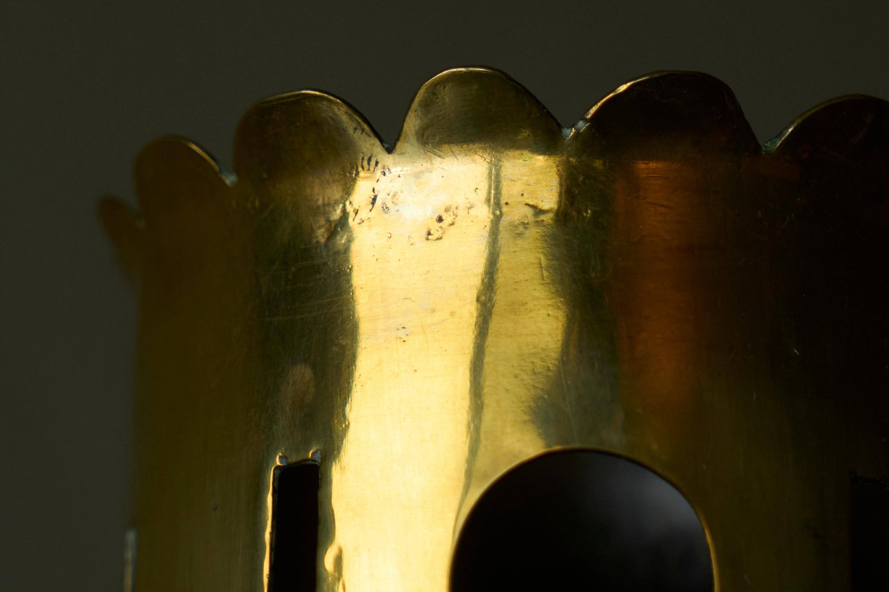 Patinated perforated brass vase from the 1920s.
