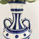 white amphora-style vase with hand-painted blue patterns