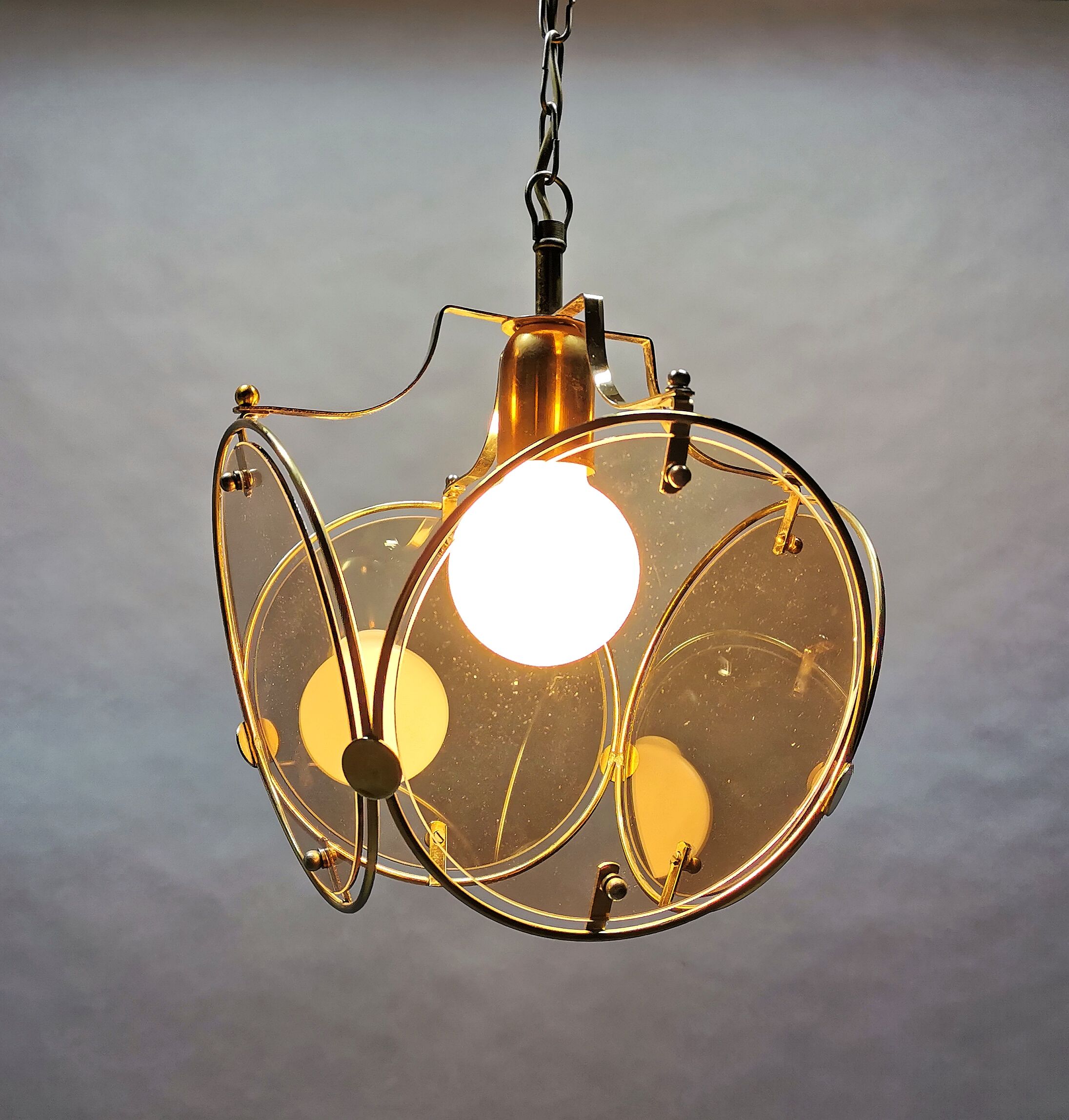 Suspension from the 70s in brass and brown smoked glass