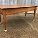 Antique solid cherry farmhouse table with 2 end drawers and 1 pull-out.