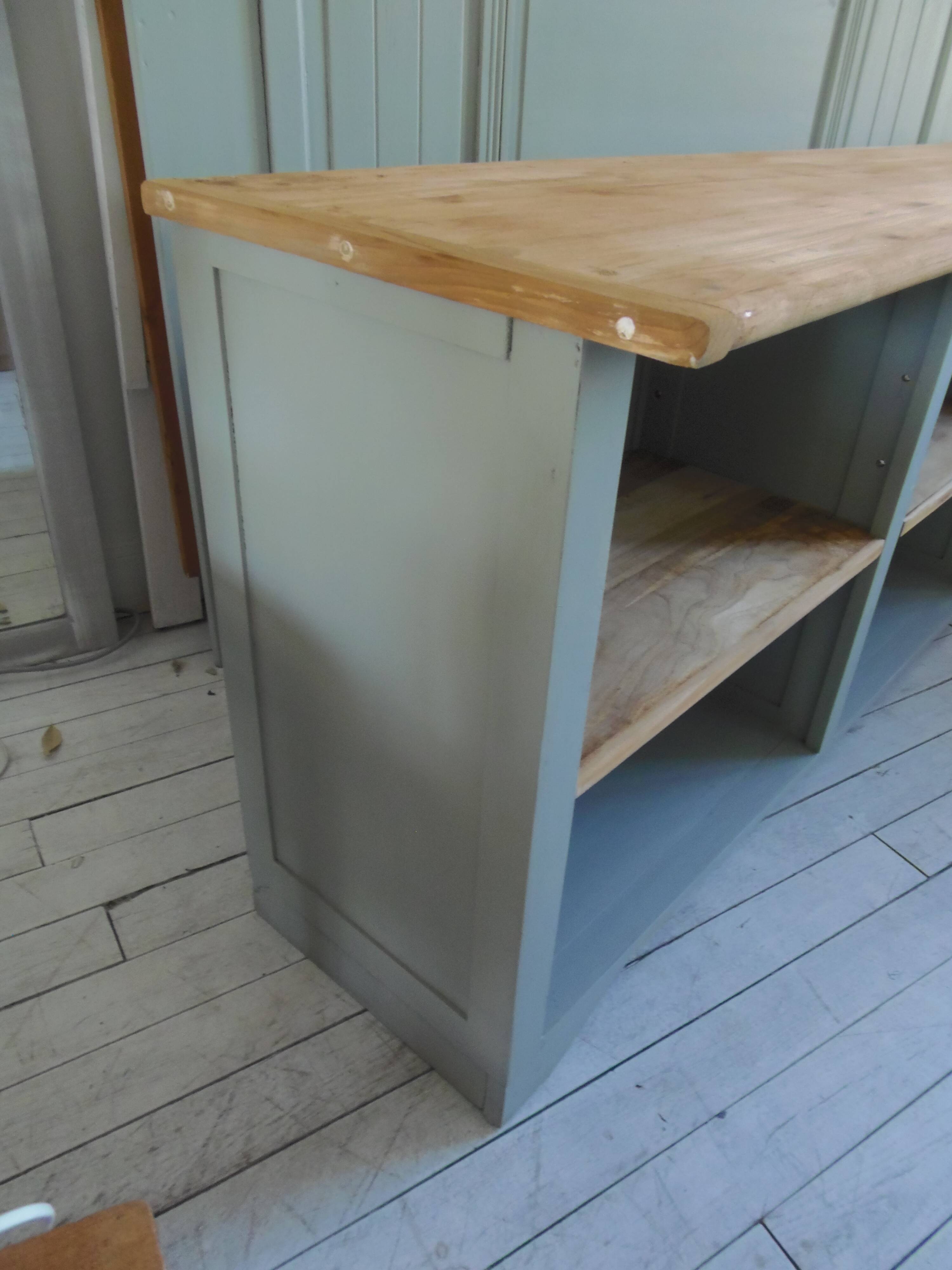 Professional furniture enhanced in verdigris, wooden top.