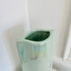 Duo of vintage iridescent ceramic vases