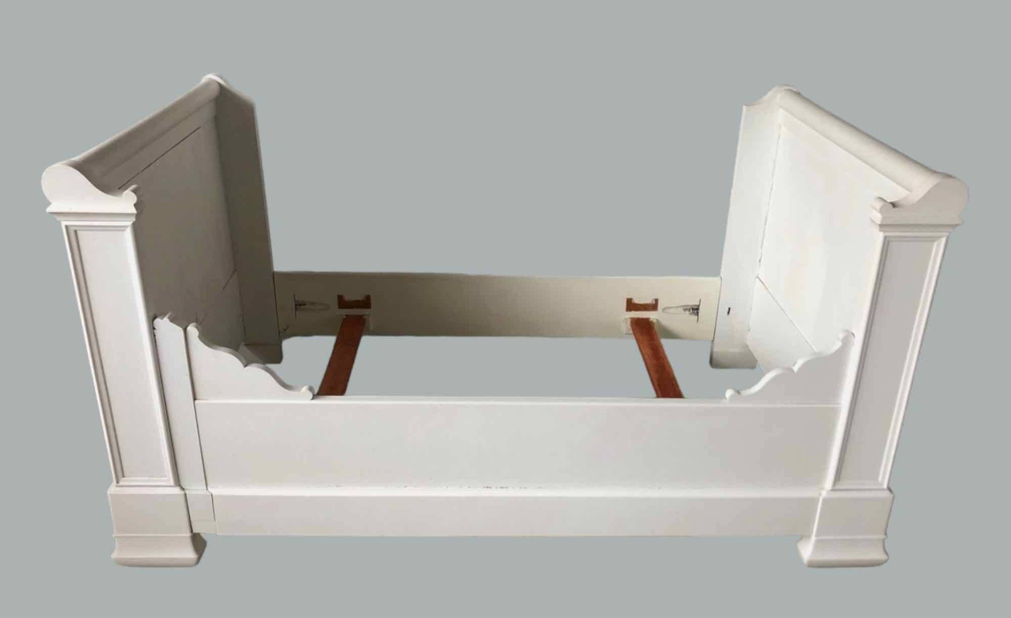 White lacquered solid wood sleigh bed