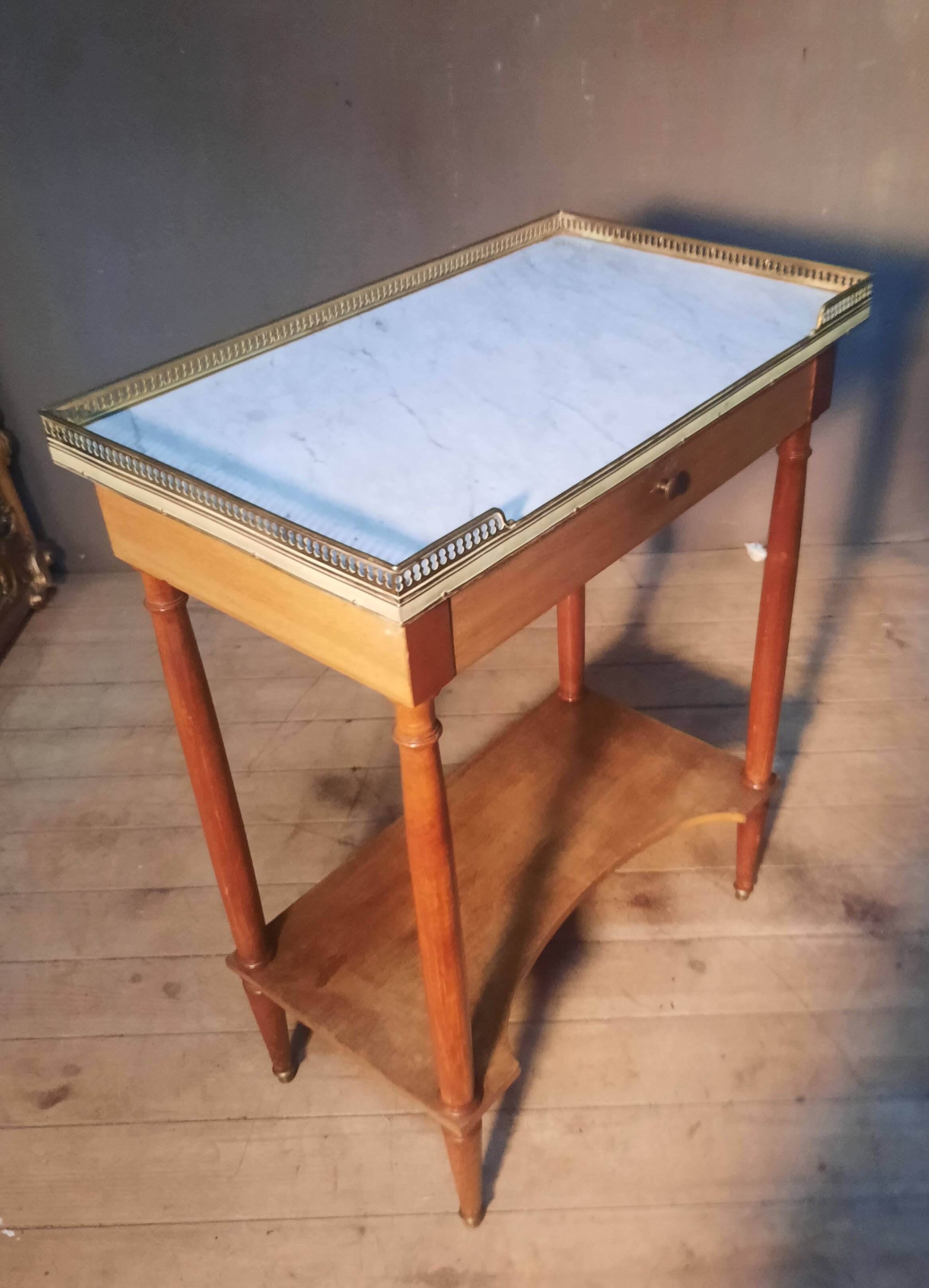 Side table in Louis XVI style.