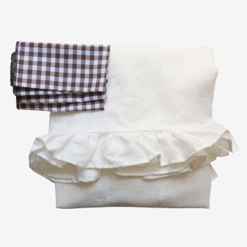White linen flying tablecloth and mismatched towels