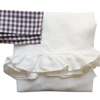 White linen flying tablecloth and mismatched towels