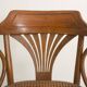Chaise bistrot avec accoudoirs en bois cintré et assise en cannage