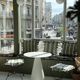 pair of wrought iron stools with cushions