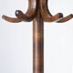 Baumann swivel parrot coat rack, dark wood.