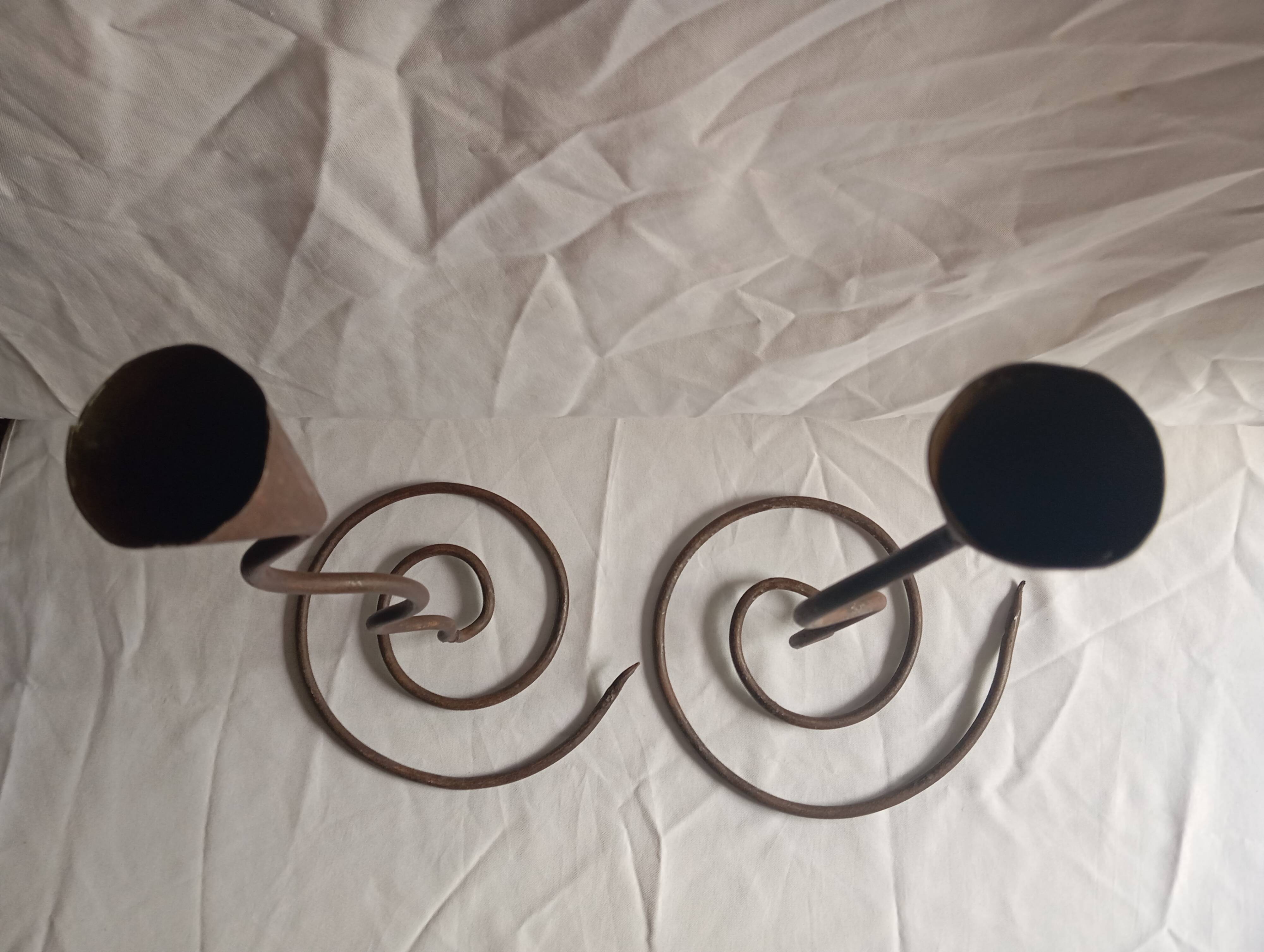PAIR OF WROUGHT IRON CANDLE HOLDERS