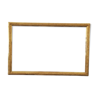 Gilded frame with gold leaf