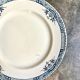 Longchamp flat plate in iron earth, “Lily” service