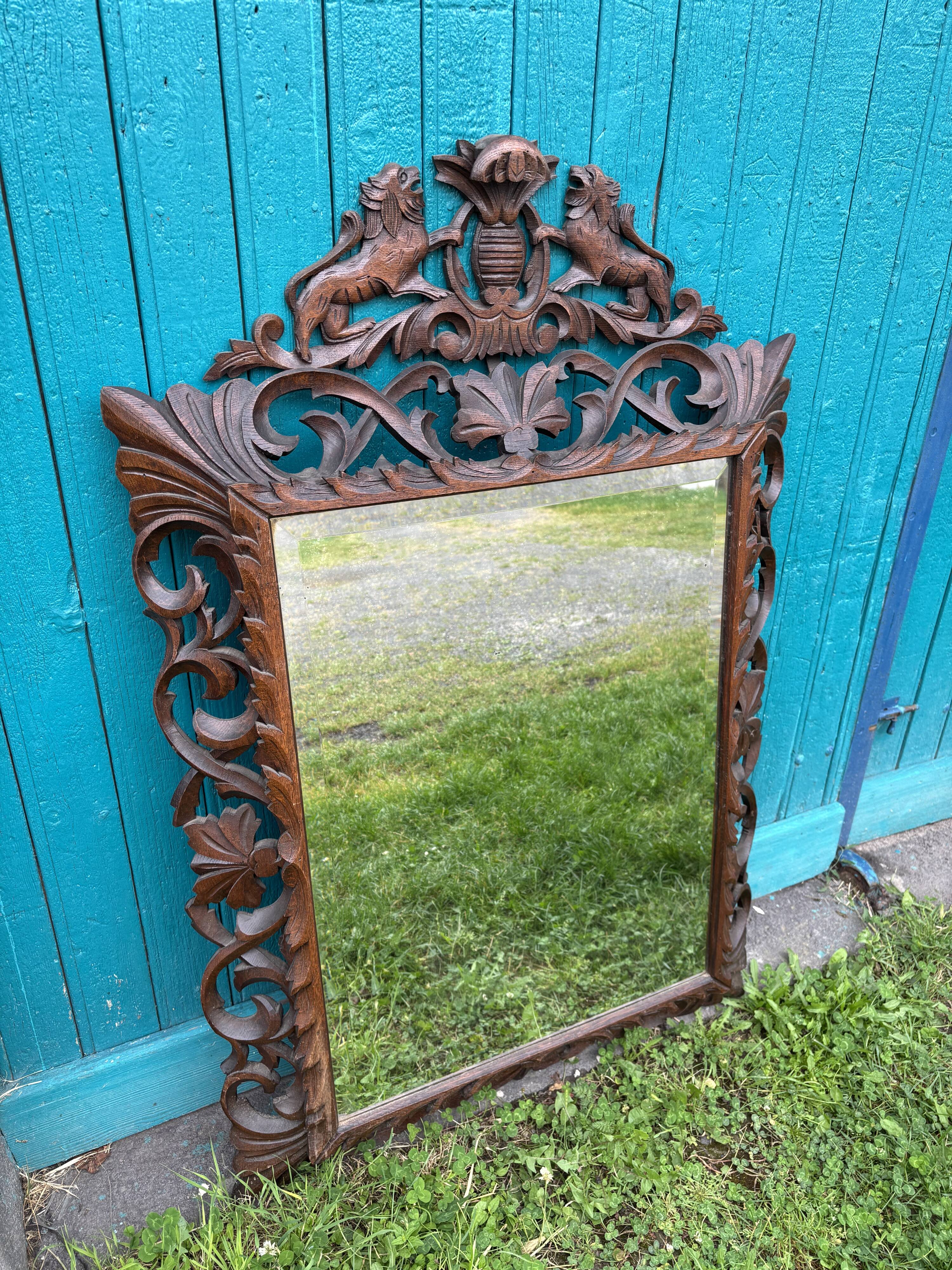 Carved wooden mirror, 19th century vintage.