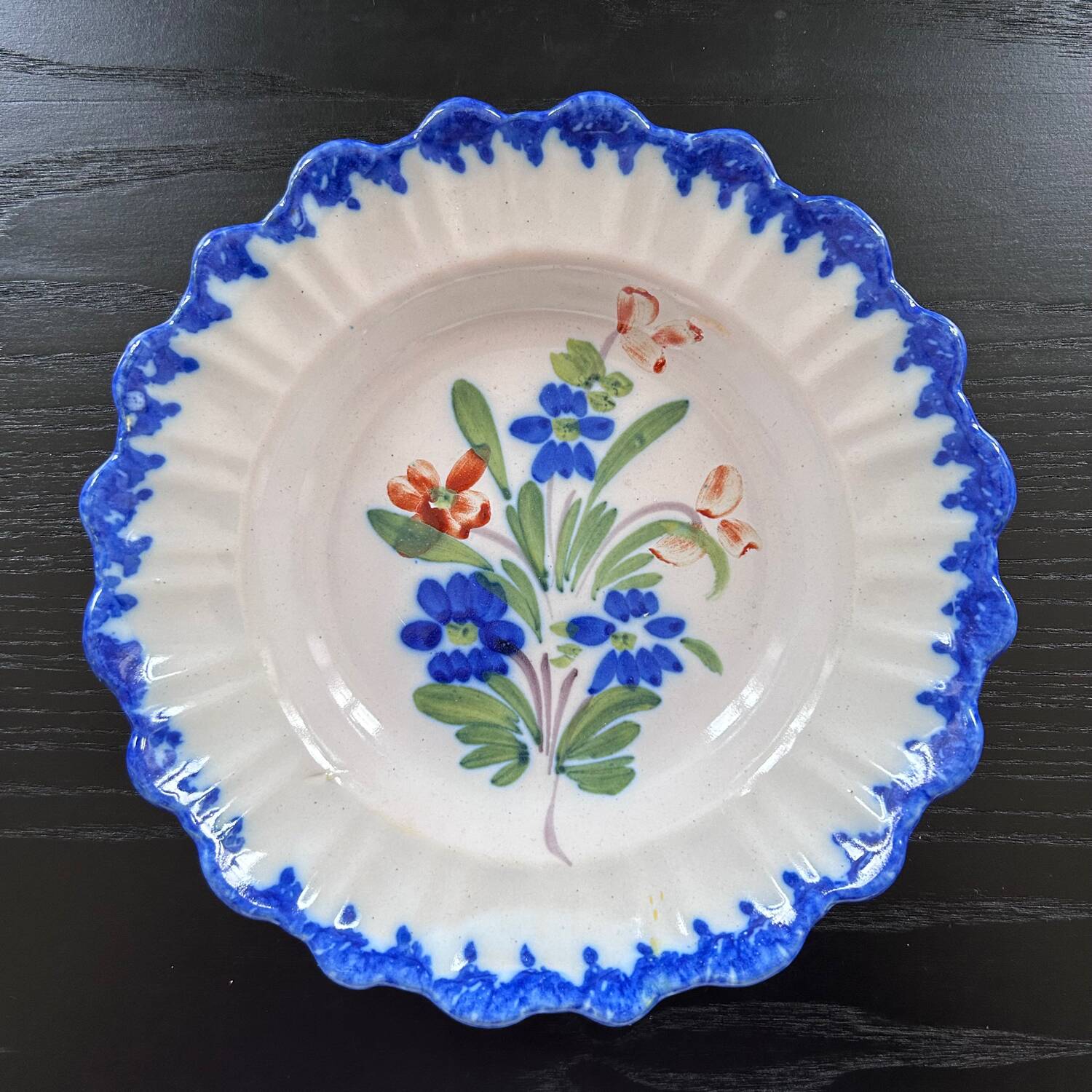 Old plate with floral decoration