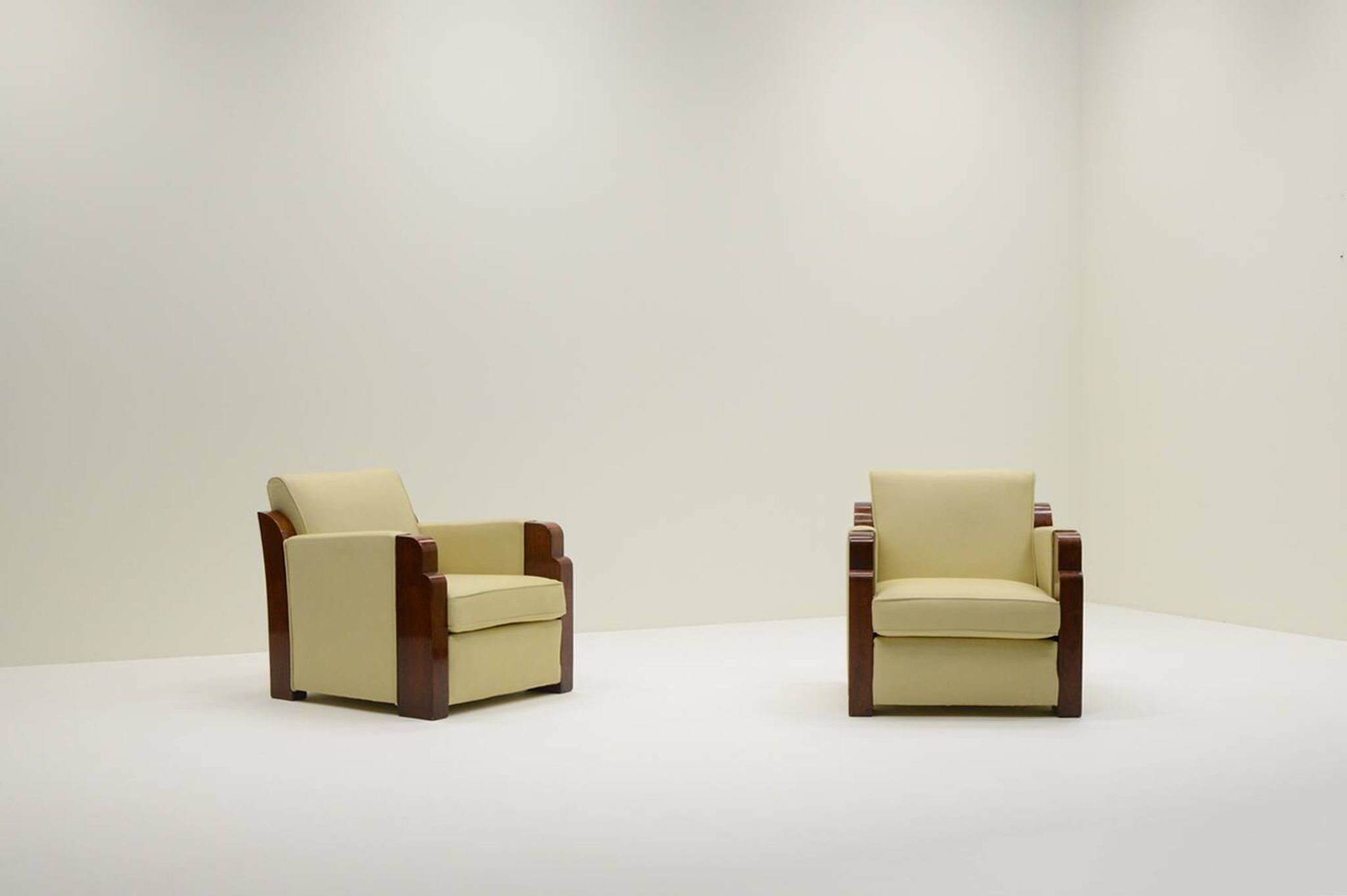 Set of 2 Art Deco club chairs in leather, France 1930s.