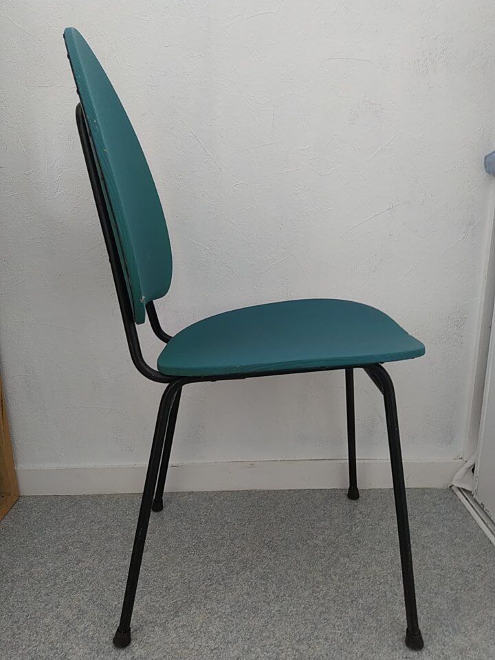 Vintage chair in turquoise green vinyl with black metal legs