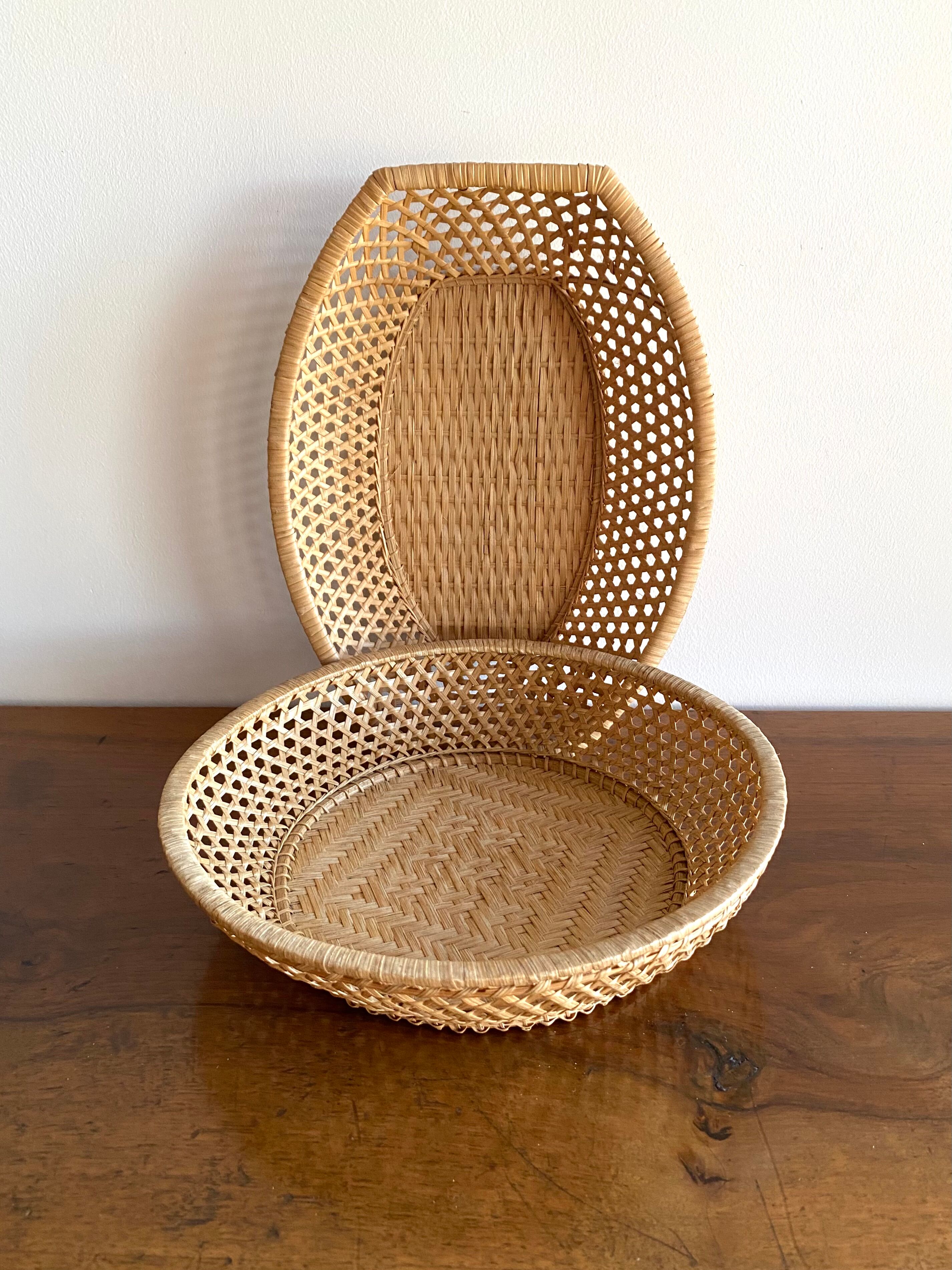 Pair of vintage braided rattan baskets