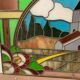 Art Deco stained glass window decorated with a 20th century church steeple