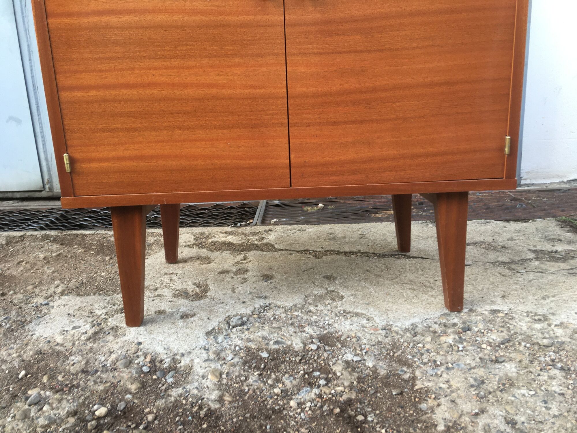 Vintage secretary with wooden compass feet with felling, shop window and closet