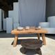 Coffee table in blond teak quadripod