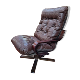 Scandinavian tilting and rotating armchair