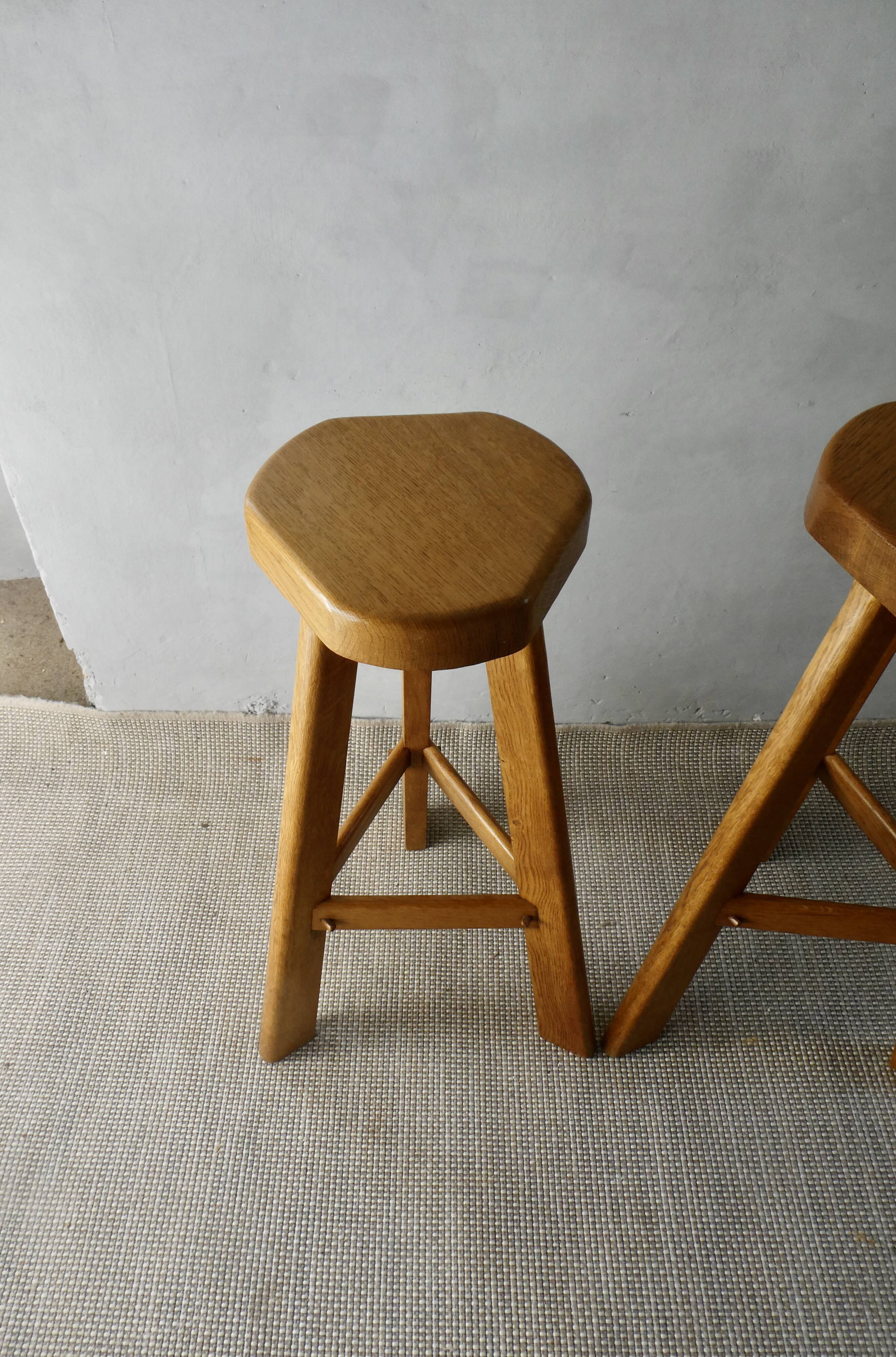 Pair of high bar stools, tripods, in solid wood