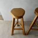 Pair of high bar stools, tripods, in solid wood