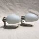 Pair of brushed steel appliques, half-egg opaline, 1970