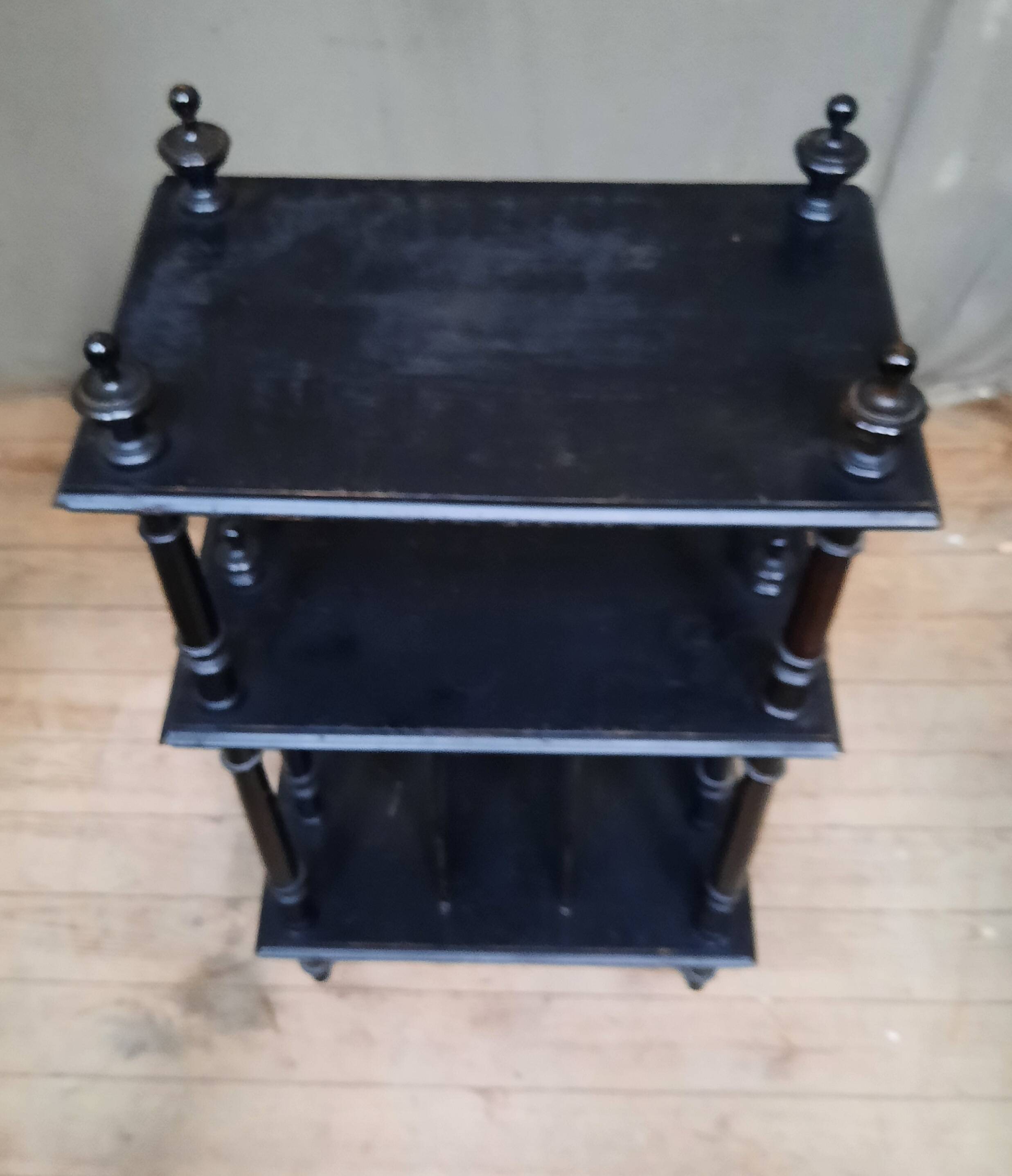 Blackened wooden shelf