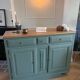 Sage green buffet with moustache legs