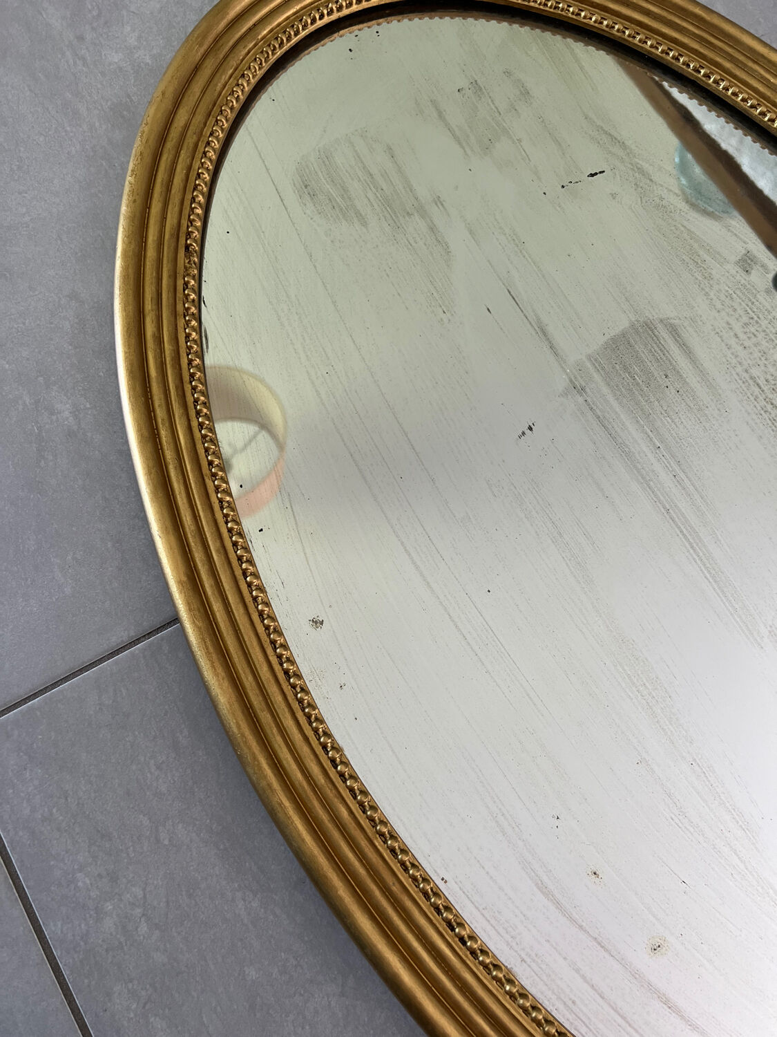 Vintage oval gold mirror