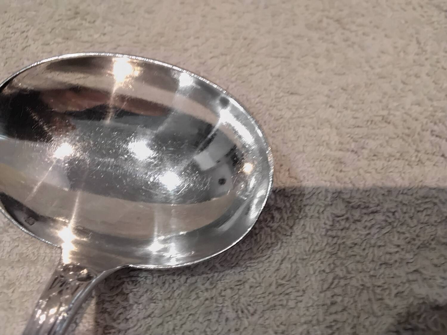 Silver-plated sauce spoon by Christofle silversmiths, Louis XVI ribbons