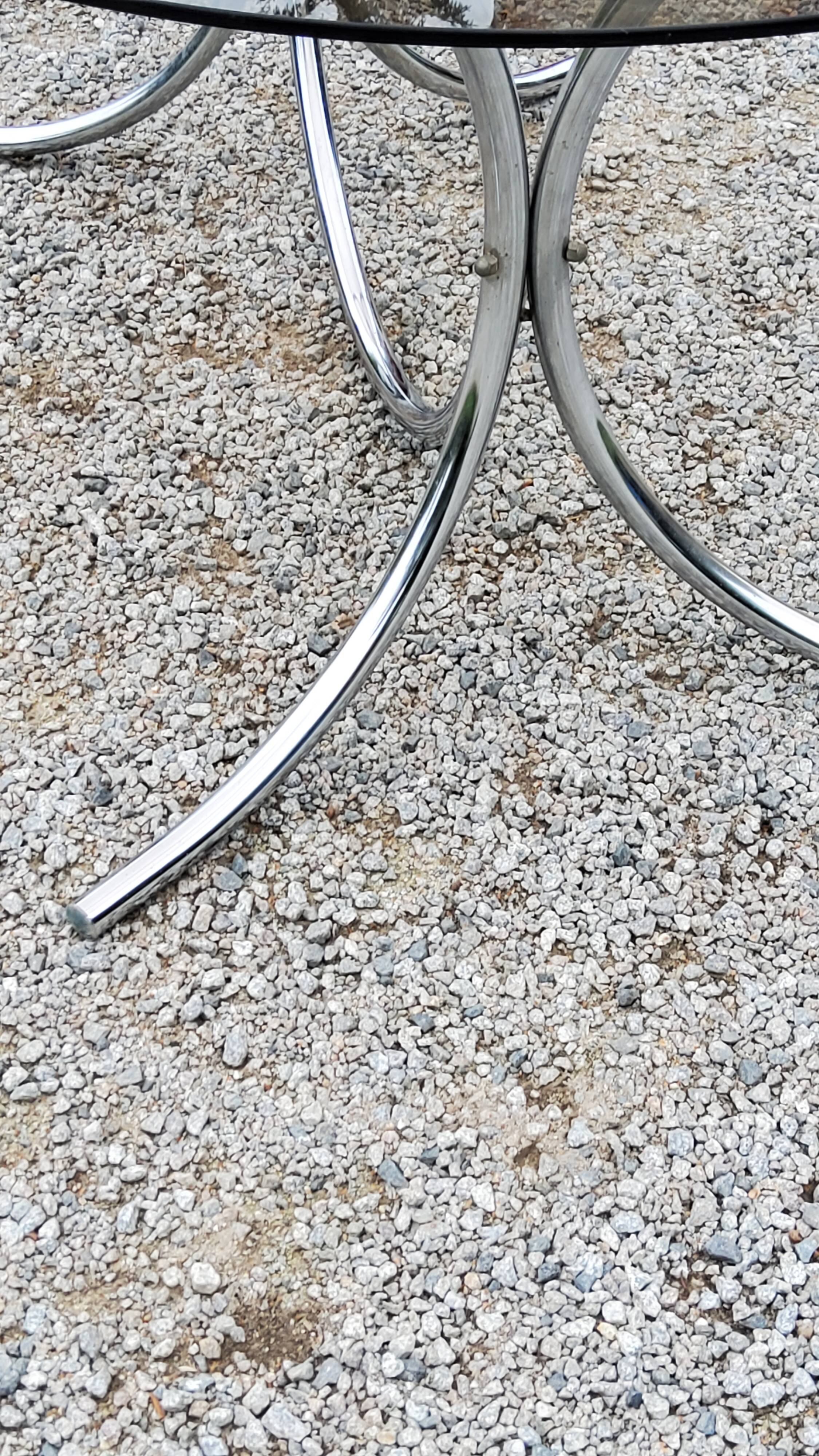 Dining table from the 70s top smoked glass base chrome