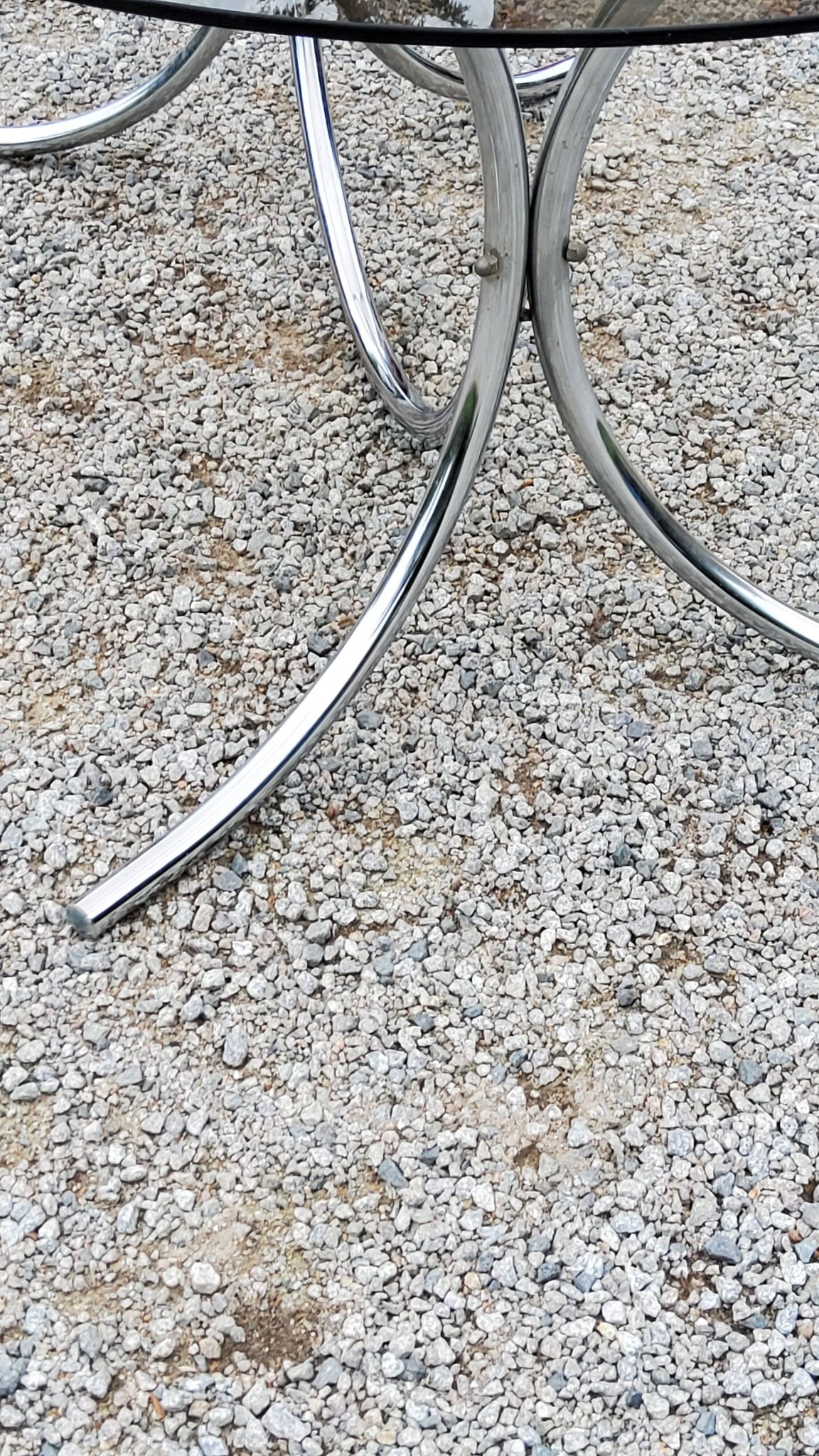 Dining table from the 70s top smoked glass base chrome