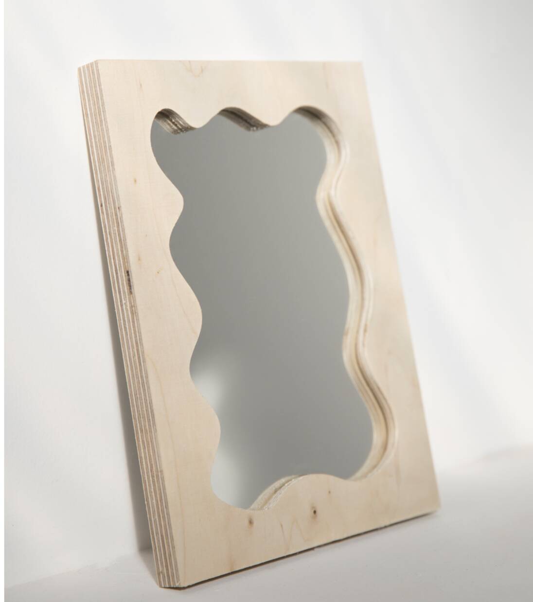 Mini splash asymmetrical mirror