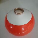 Bucket with 70s bottles