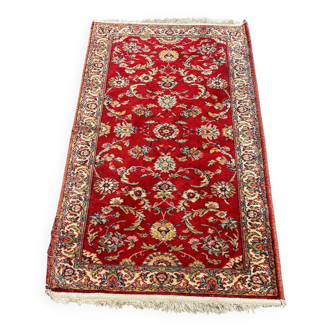 Handmade Persian wool rug with burgundy flowers 140x70