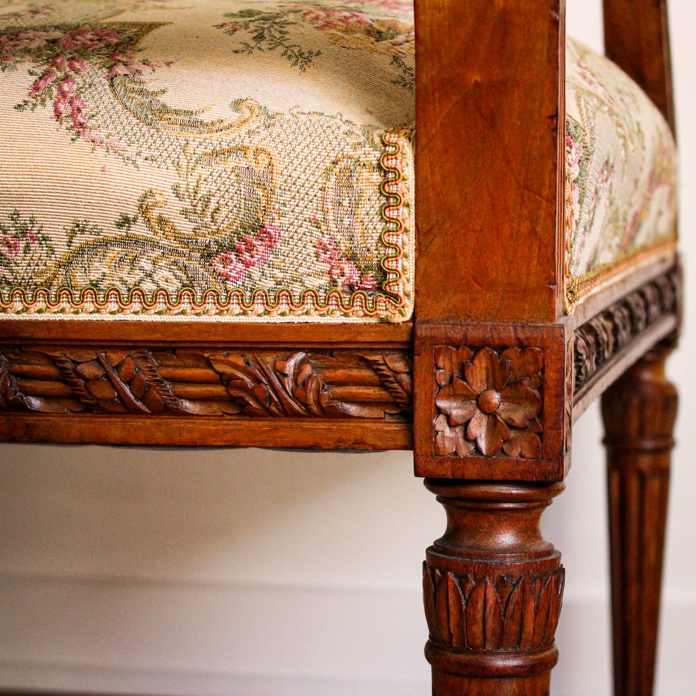 Louis XVI style carved armchair