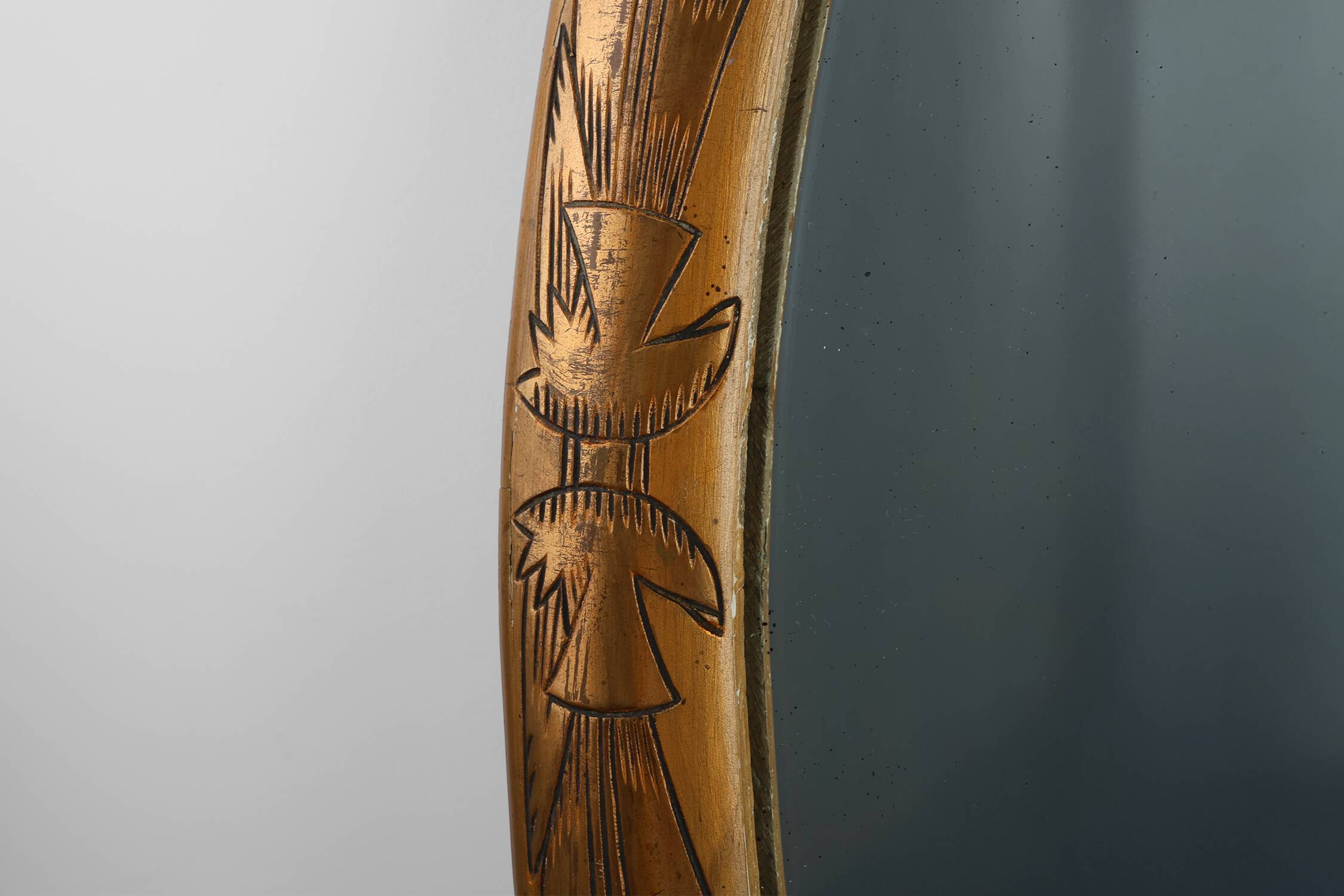 French Art Deco Oval gilded Mirror in Carved Wood, ca. 1920