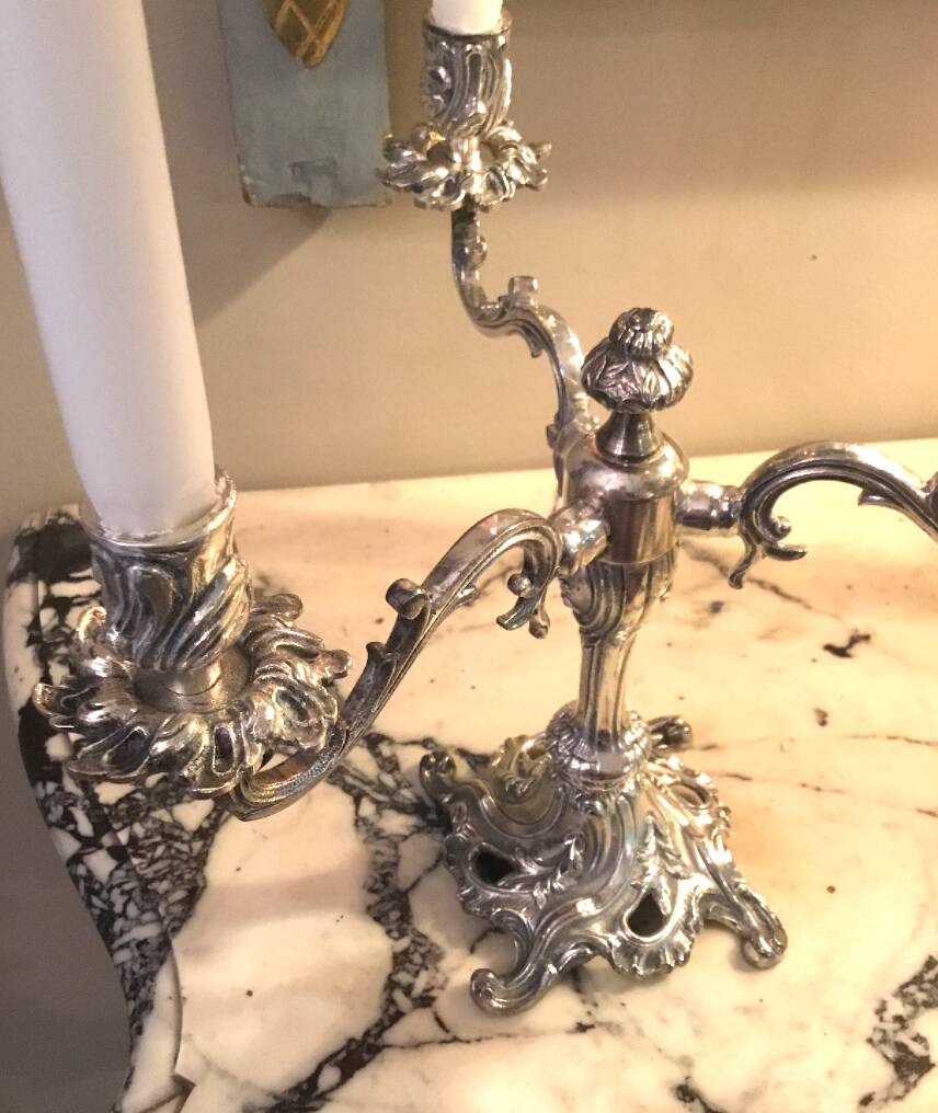 Pair of three-armed silver-plated metal candelabras