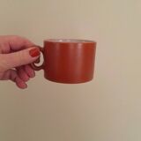 terracotta cups with saucers