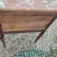 Antique marquetry commode with marble top in Louis XVI style.