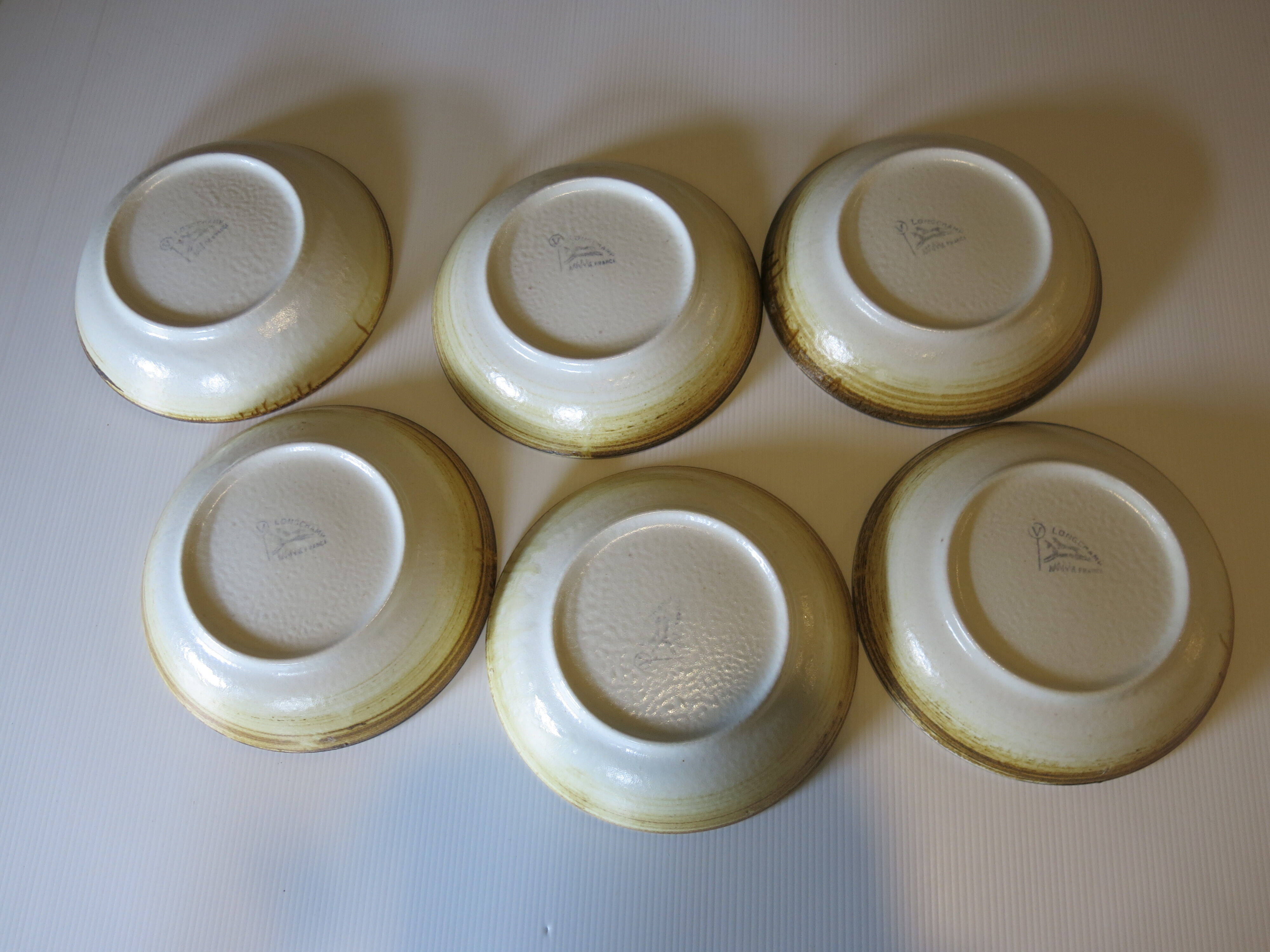 6 assiettes creuses en grès Longchamp en très bon état