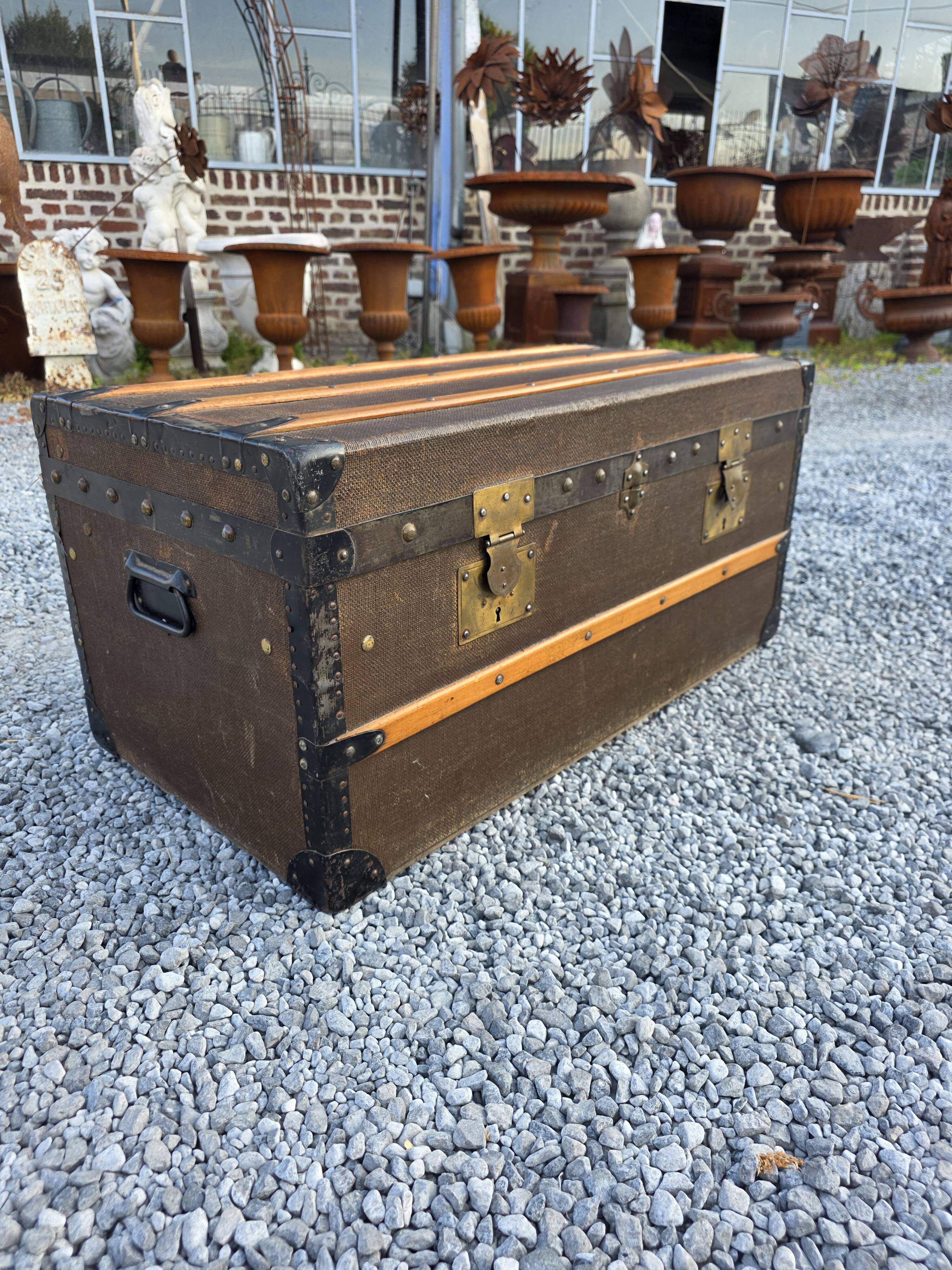 Old travel trunk in oilcloth