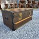 Old travel trunk in oilcloth