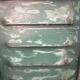 Lot of old green shutters in 4-part iron screen headboard