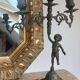 Set of 3 antique three-branch candelabras with cherubs and bronze patina.