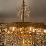 Old brass chandelier and crystal grapevines