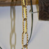 Old brass chandelier with glass stamps